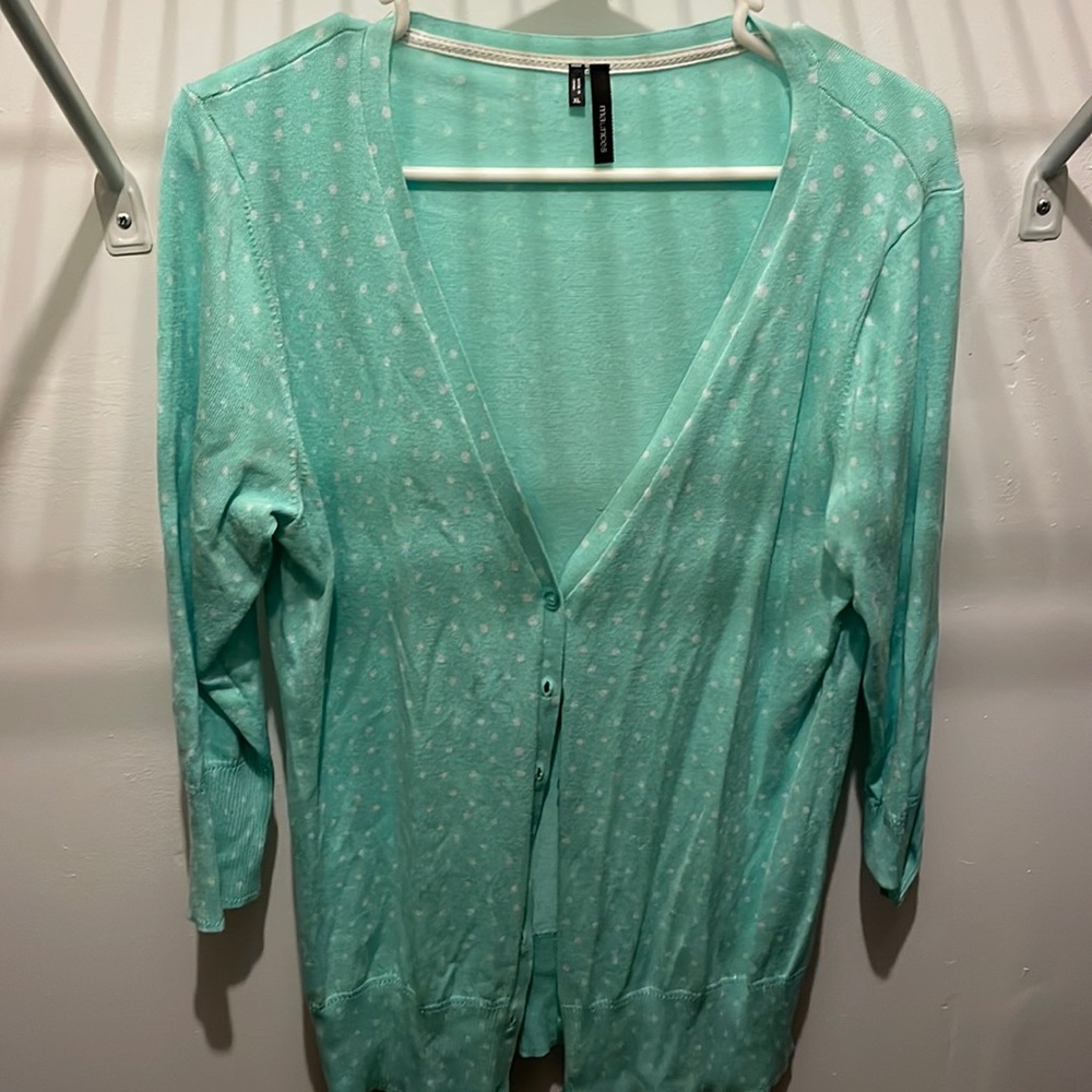 Bright, teal polka dot sweater